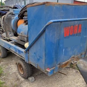 foto WOMA 1502 pompa 570bar wysokie ciśnienie 110kW 1.500 ltr/min. przyczepa