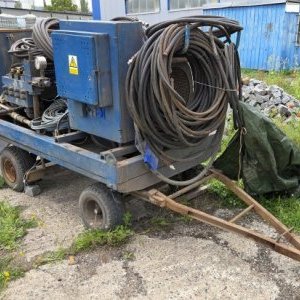 foto WOMA 1502 pompa 570bar wysokie ciśnienie 110kW 1.500 ltr/min. przyczepa