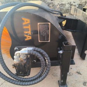 foto Skid steer loader sweeper
