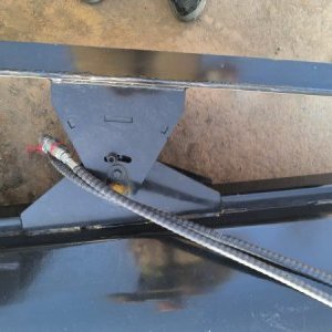 foto Skid steer loader sweeper