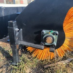 foto Skid steer loader sweeper