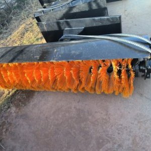 foto Skid steer loader sweeper