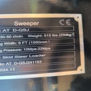 foto Skid steer loader sweeper