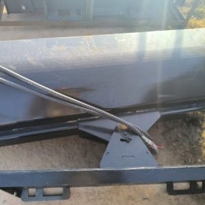 foto Skid steer loader sweeper